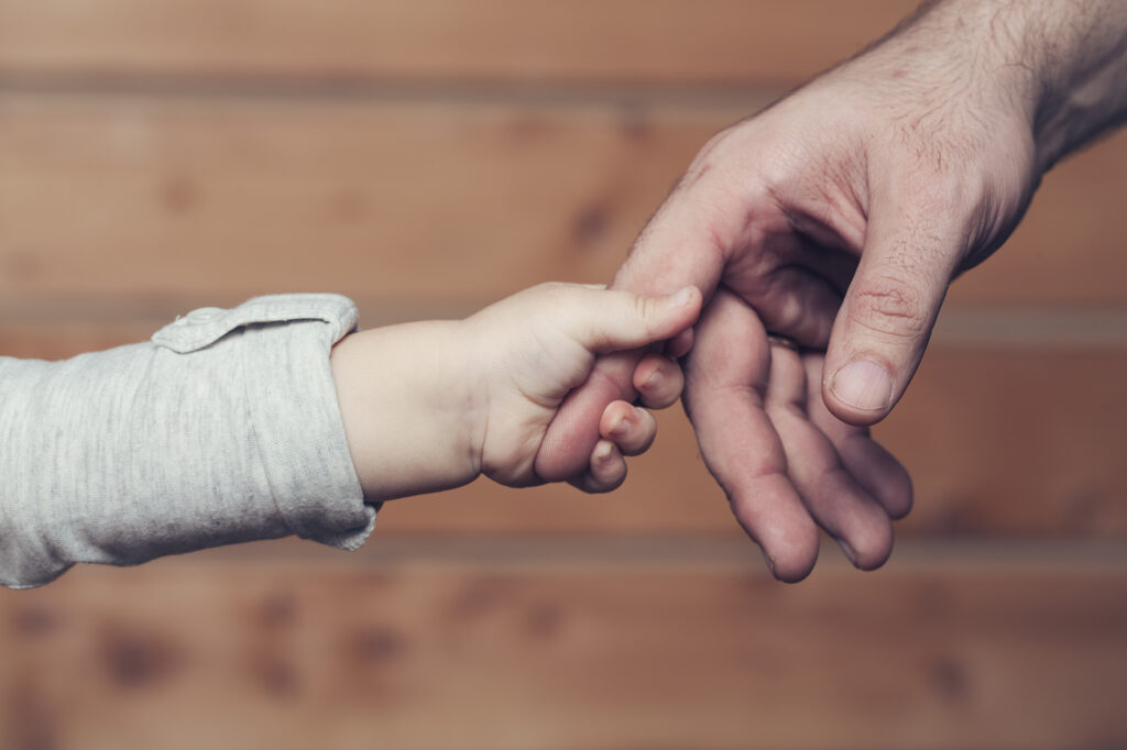 EARS - Baby hand reaching for adult